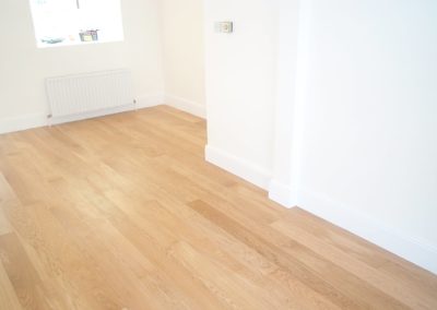 Fitted floor on completion with skirtings trimmed