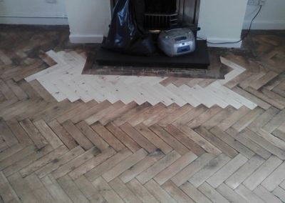 Wood Parquet repair in progress