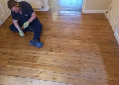 Pine Floorboard Restoration with Pine Slivers, in Tadworth